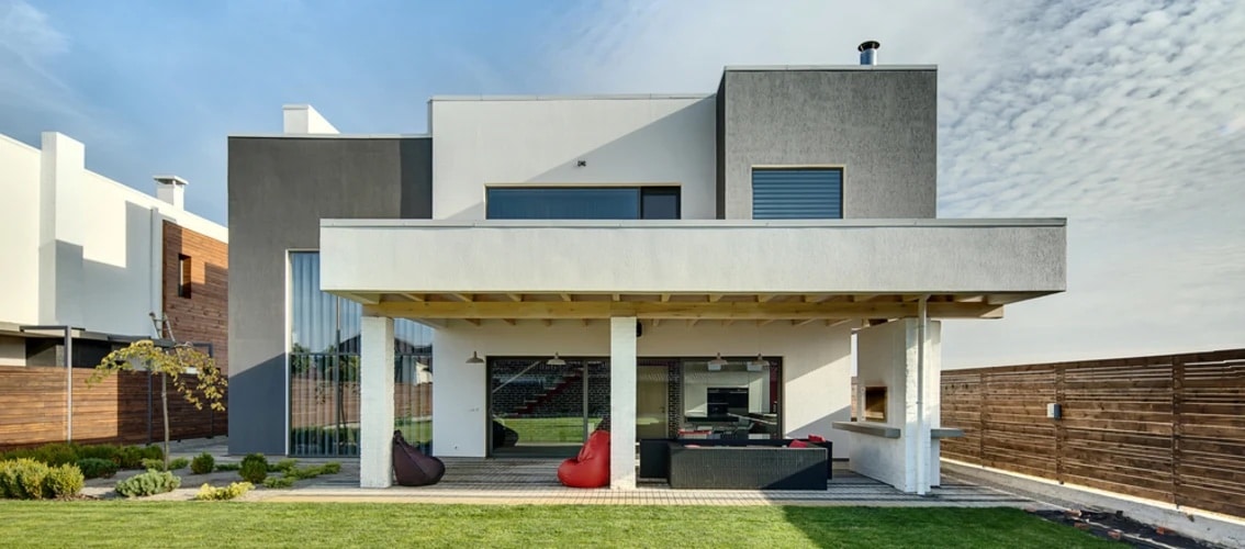 two story modern home with large windows