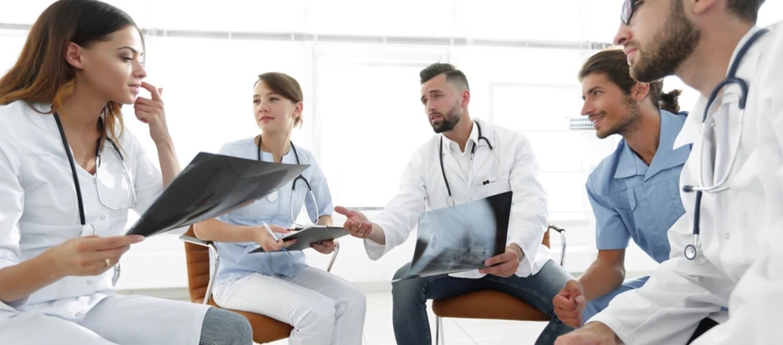 young doctors having a group discussion