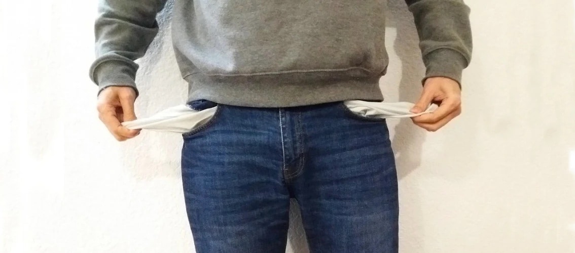 Resident pulls the pockets out of his jeans