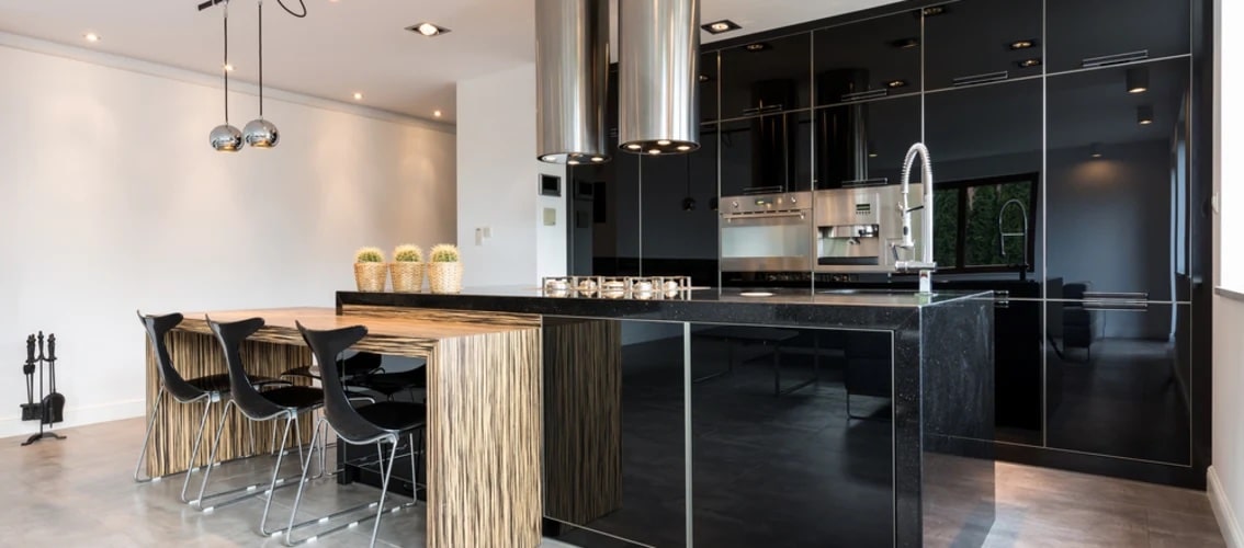 large new black kitchen with table