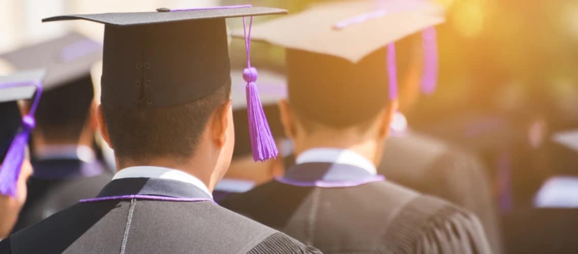Medical students walk at graduation