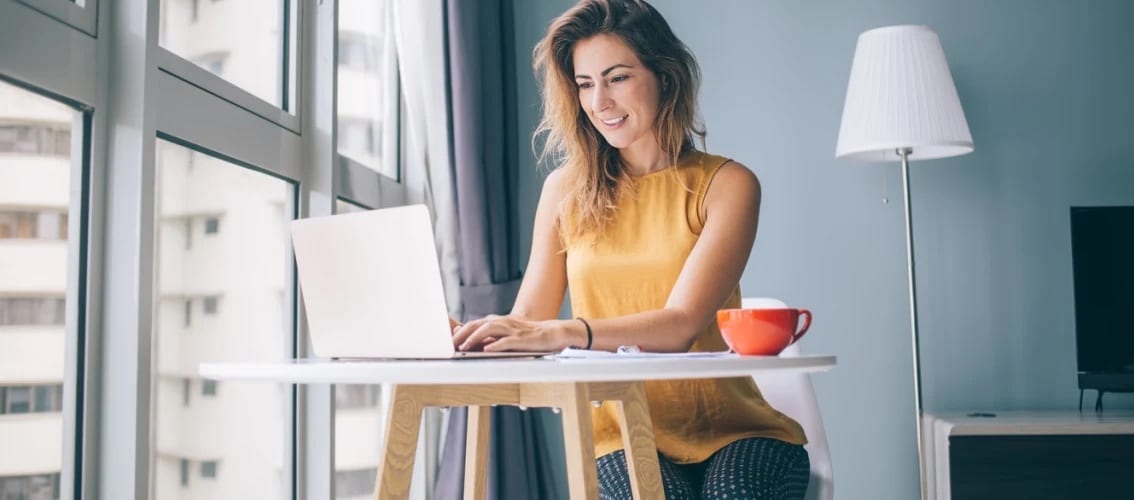 Female physician working on her computer.