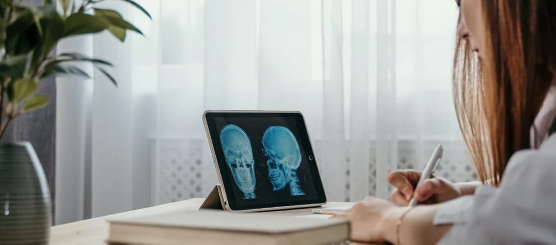 Medical student studying at a desk
