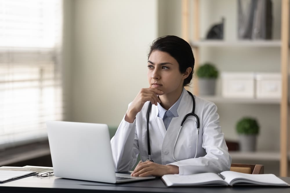 Doctor contemplating malpractice insurance