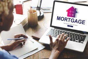 female doctor looks for a mortgage online
