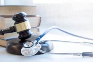 Medical regulations represented by a gavel and stethoscope.