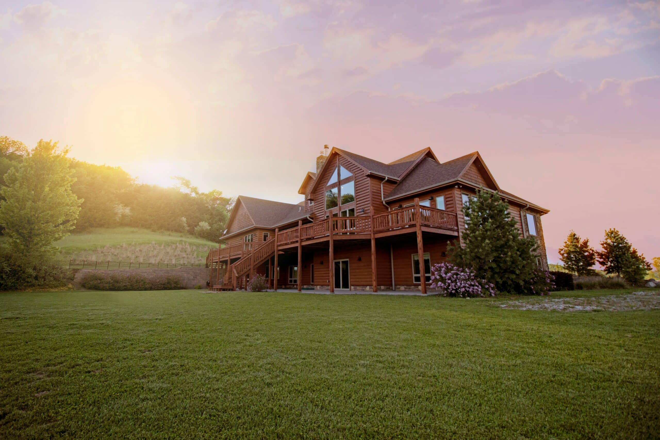 Picturesque log home at sunset.